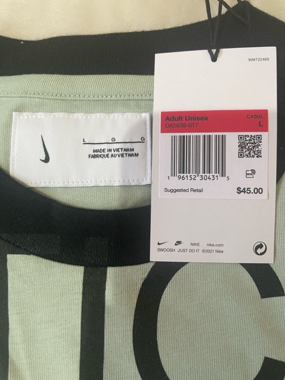 Nike Mint Green Tee with Black Collar and Print